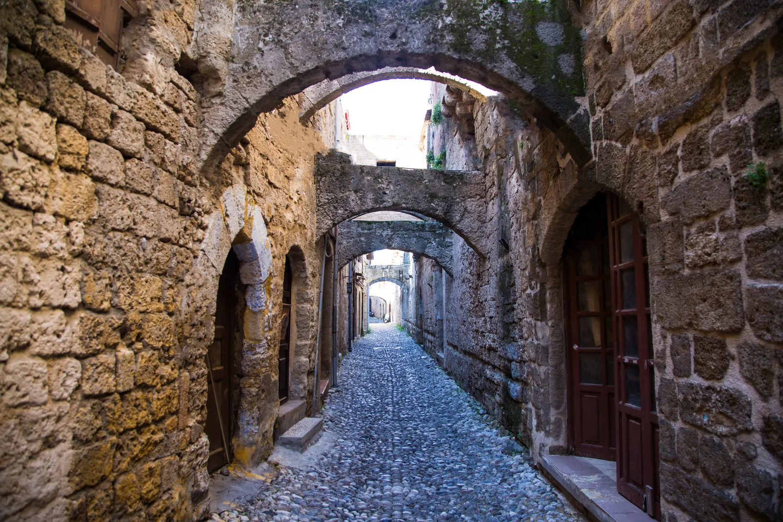 Stone passageway through the historic old town of Rhodes